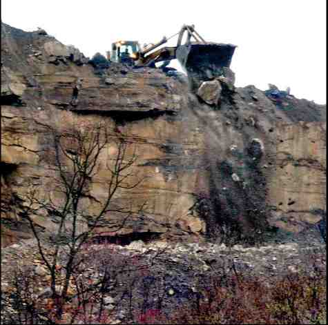 Bulldozer pushes MTR debris into a valley, location & date unknown/Michael Williamson, The Washington Post, washingtonpost.com Bulldozer pushes MTR debris into a valley, location & date unknown/Michael Williamson, The Washington Post, washingtonpost.com