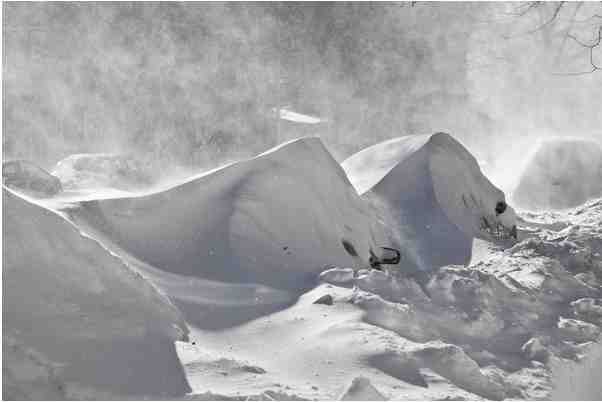 Cars buried in snow, Greenwood Avenue, Brooklyn NY, Dec 27, 2010/Montalbetti Campbell, nytimes.com