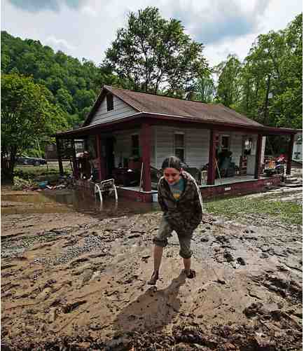 Girl walks through mud after flood, Mingo County WVa, May 09/Stephen W. Rotsch, West Virginia Governor’s Office, chickahominy.davidmlawrence.com Girl walks through mud after flood, Mingo County WVa, May 09/Stephen W. Rotsch, West Virginia Governor’s Office, chickahominy.davidmlawrence.com