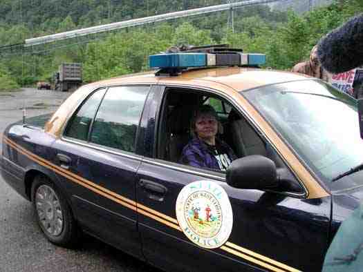 Judy is taken away by state police during march & rally at Massey’s Goals Coal processing plant, Sundial, WVa, May 24, 2005/ Vivian Stockman, OHVEC, ohvec.org Judy is taken away by state police during march & rally at Massey’s Goals Coal processing plant, Sundial, WVa, May 24, 2005/ Vivian Stockman, OHVEC, ohvec.org