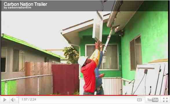 Green job trainees install solar panels, Richmond, CA, image from trailer for “Carbon Nation”/ carbonnationthemovie.com