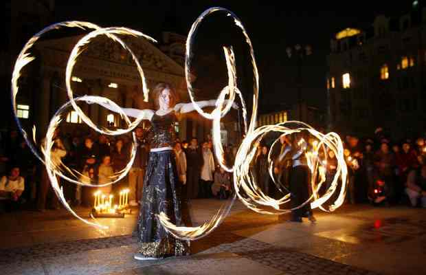 Fire acrobats perform in Sofia, Bulgaria, Earth Hour, March 28, 2009/Stoyan Nenov, Reuters, The Vancouver Sun, vancouversun.com