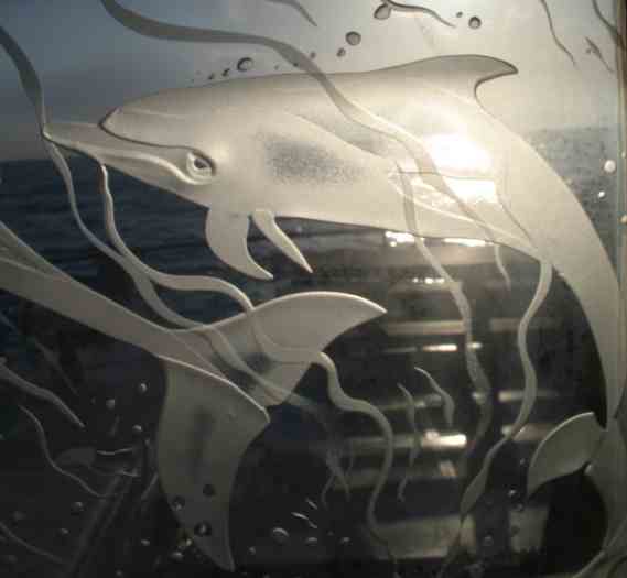 Detail, RV Stenella cabin door window by glass artist Patricia Weyer/GK Wallace