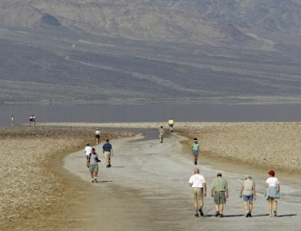 Visitors walk toward Badwater Basin, lowest place in the U.S. at 282 feet below sea level, Death Valley National Park, CA, March 10, 2005/Damian Dovarganes, AP, The Washington Post http://www.washingtonpost.com/national/meteorological-group-says-c…t-spot/2012/09/14/a3e26536-fe74-11e1-98c6-ec0a0a93f8eb_story.html