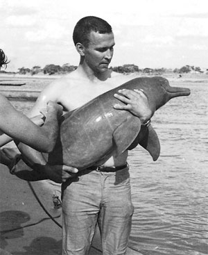 David Kenney with captured dolphin, Brazil, 1965/Kenney Family photo, Los Angeles Times