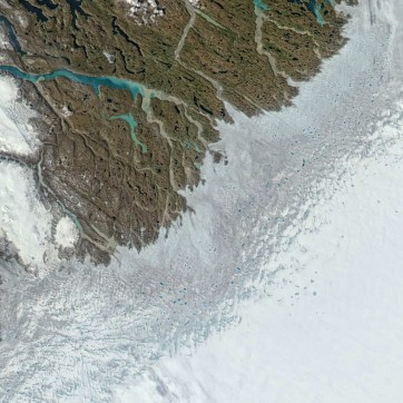 Melt ponds and melting ice surfaces, southwest coast of Greenland, June 12, 2016 / NASA, EOSDIS / Click to learn more.
