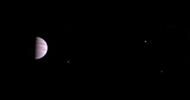First color image of Jupiter taken by JunoCam with moons Io, Europe and Ganymede, July 10, 2016 / NASA, JPL-CalTech, SwRI, MSSS / Click to enlarge and learn more.