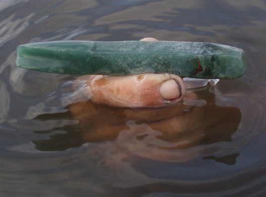1,000-year-old jadeite blade found in lagoon in Belize, undated / Heather McKillop, LSU, COSMOS / Click for more.