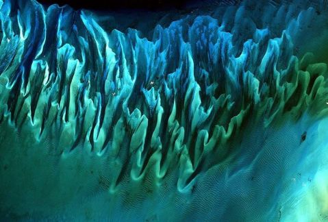 Ocean sand, Bahamas, 2001 / NASA / Click for more.